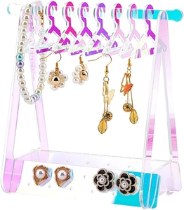 Detail view of iridescent acrylic jewelry organizer with miniature clothes hangers