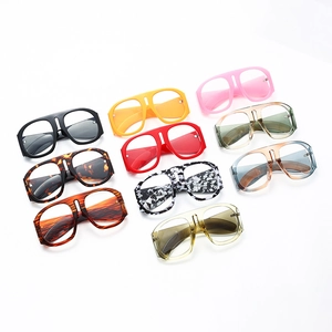 Oversized flat top glasses collection featuring various vibrant colors and trendy patterns