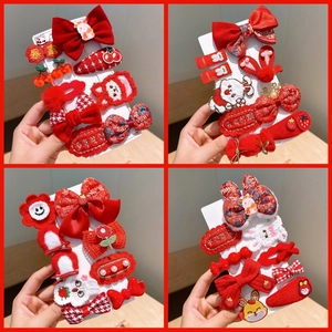 Festive red children's hair clip set with cute rabbit and bow designs for New Year
