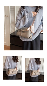 Detail of grey lychee leather handbag with elegant pink heart pattern silk scarf strap
