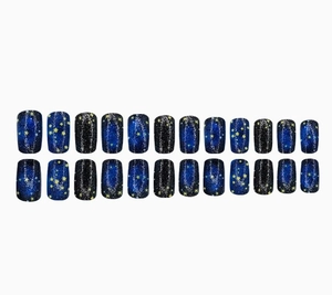 Detail view of 24 pieces galaxy dark blue square press on nails with gold stars