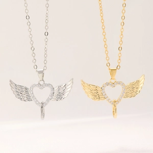 Sparkling angel wings heart pendant necklace in gold and silver finish with zircon stones
