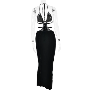 Detailed back view of a black knitted halter dress with cut-out waist and tie-up ribbons