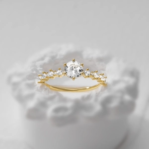 Detail of S925 sterling silver ring with square diamond setting and marble texture background