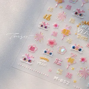 Detail of 3D embossed nail art stickers with festive lion dance and floral patterns