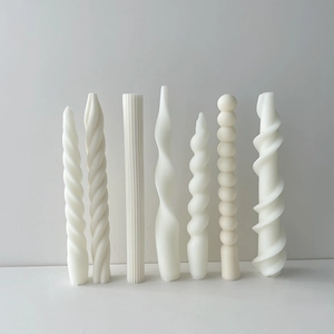 Minimalist white spiral and twisted geometric silicone candle molds for creative DIY making
