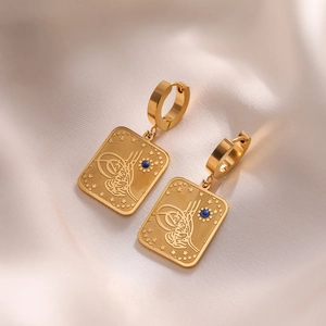 Gold tarot rectangle drop earrings with Arabic calligraphy and blue gemstone detail