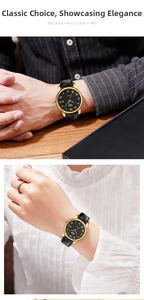Close-up of classic couple watches with gold casing and black leather straps on wrist