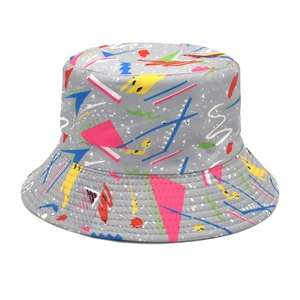Detail of graffiti bucket hat featuring 90s vintage geometric patterns on grey fabric