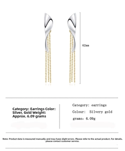Detail view of 62mm two-tone leaf tassel drop earrings with gold bead chains