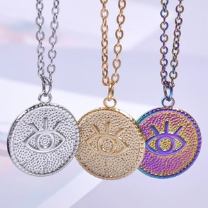 Three evil eye coin pendants in silver, gold, and rainbow stainless steel with fine chains