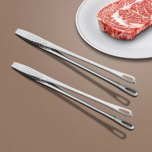 Stainless steel BBQ tongs with non-slip heads for grilling steaks and buffet food serving