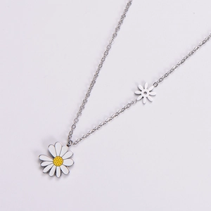 Silver titanium steel necklace featuring dual white enamel daisy flower pendants