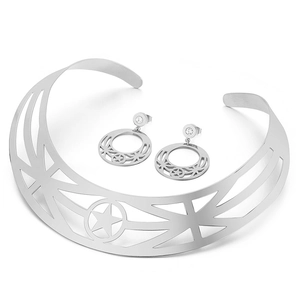 Exaggerated silver metal choker and star earring set with crystals on white background