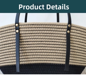 Detail of woven tote bag with beige and black texture, leather strap and gold rivets