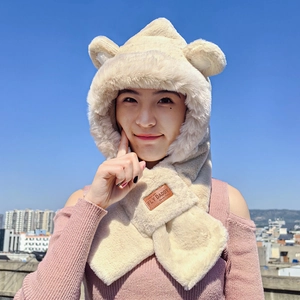 Detail of cream plush hooded scarf with bear ears and FLY DADDY leather label