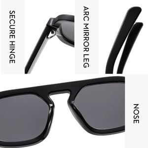 Detail view of durable hinges, ergonomic arc legs and integrated nose pads on black sunglasses
