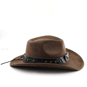 Detail of a brown suede cowboy hat featuring a studded belt and silver bull head ornament