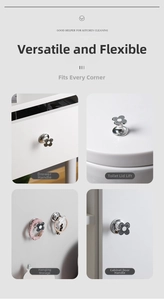 Silver flower handle used as a drawer pull, toilet lid lifter, and wall hook utility