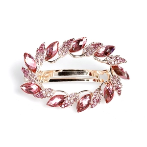 Rose gold hollow spring hair clip featuring pink marquise crystals in a leaf design