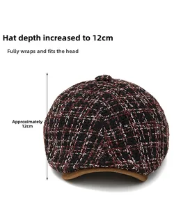 Detail view of plaid newsboy hat featuring 12cm deep fit and brown suede brim