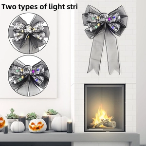 Black mesh Halloween light-up bow with silver skull pattern and dual-mode LED lights