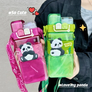 Detail of square panda straw cups with matching adjustable straps and 3D cartoon stickers