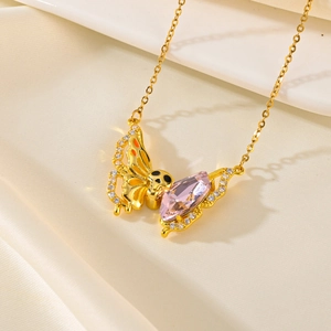 Titanium butterfly necklace with pink gemstone and crystals on silk background