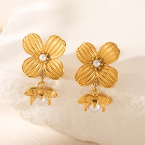 18k gold plated stainless steel floral earrings featuring pearls and brushed metal finish