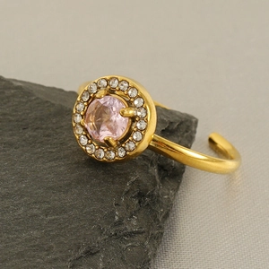 18k gold plated ring with round pink crystal and white pavé stones on grey stone base