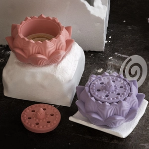 Detail of lotus resin mold showing layered petals and ventilated lid in mauve and pink