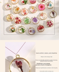 Macro view of handmade resin flower pendant with real dried petals and gold alloy frame