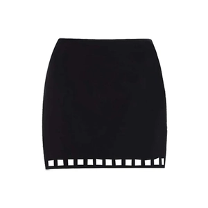 Detail view of black bodycon mini skirt featuring unique geometric hollow-out hem design