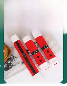 Three-piece red Christmas refrigerator handle covers with Santa belt and white plush trim