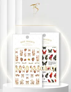 Detailed view of self-adhesive 3D nail art stickers with rabbit and butterfly themes