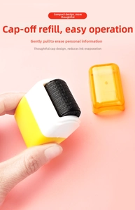 Detail of yellow privacy roller stamp covering personal data on a pink background