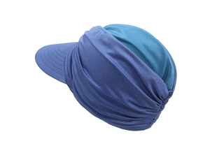 Detail of navy and teal double-sided sun hat showing wide brim and elastic structure