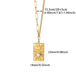 Detailed view of 18K gold plated necklace with sunburst pendant and cubic zirconia stone