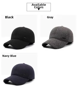 Close-up of winter wool-like baseball caps with ear protection and Daria metal logo