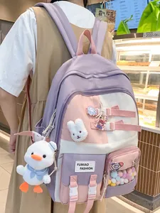 Cute purple and pink patchwork school backpack for girls with duck plush pendant