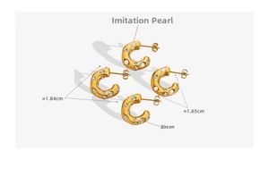 Detailed view of gold C-shaped earrings with zircon and pearl sizing measurements