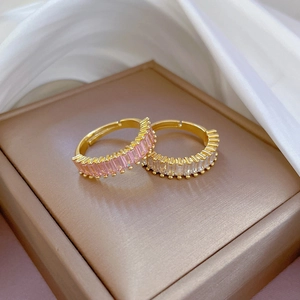 Elegant gold open ring featuring rectangular pink and white cubic zirconia crystals