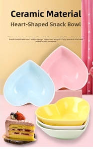 Macro view of assorted heart-shaped ceramic dipping bowls in pastel macaron colors