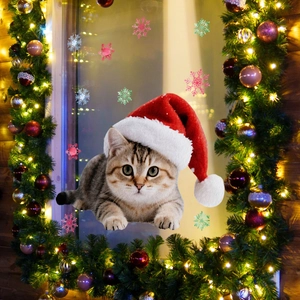 Christmas window sticker featuring a cute cat in a Santa hat with colorful snowflake motifs