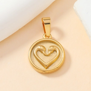 Golden stainless steel round pendant featuring embossed twin swans forming a heart shape