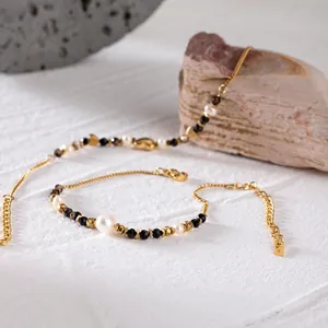 18K gold plated stainless steel bracelet with white pearls and black natural stones