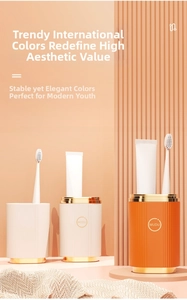 Detail of portable travel toothbrush cups with gold rim and vertical striped texture