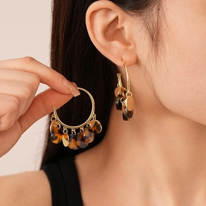 Vintage leopard resin and gold hoop earrings featuring stylish round charms for women