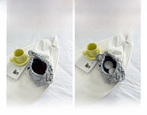 Internal view of silver pleated cloud bag showing spacious capacity for cosmetics