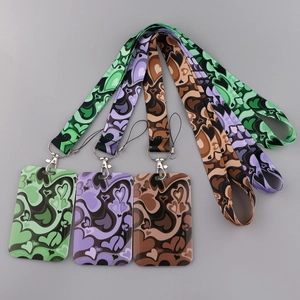 Three sets of heart patterned card holders with matching polyester lanyards and metal clips